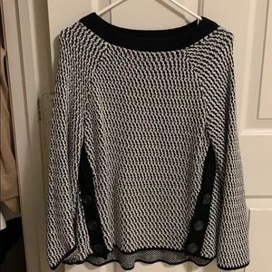 bell sleeved black and white sweater